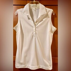 NIKE GOLF WOMENS
SLEEVELESS POLO
SIZE MEDIUM